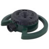 This image shows a circular, green garden sprinkler with a black top, featuring multiple nozzle holes and adjustable arms for various spray patterns.