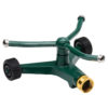 This is a green, four-arm rotating lawn sprinkler with black wheels on two arms and a brass hose connector, isolated on a white background.