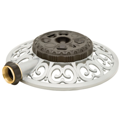 This is a rotating sprinkler for a garden, set against a white background. It has a circular, decorative white base with a black sprinkler head and a hose connector.