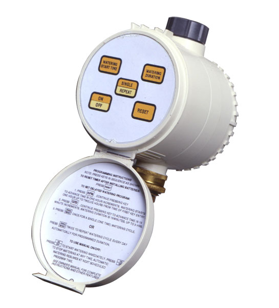 This image depicts an irrigation timer with dials and buttons for various settings, including watering duration and scheduling, against a white background.