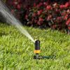 Melnor Turbo Rotary Sprinkler spraying water on green grass