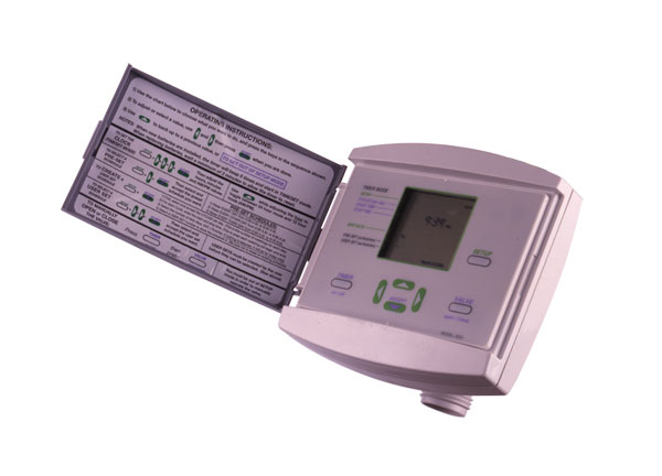 This is a digital programmable thermostat with an open cover, displaying settings and instructions. It has an LCD screen and a grayish-purple housing.