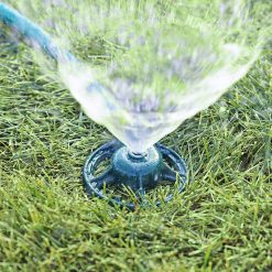 Melnor Circular Spot Sprinkler watering green lawn