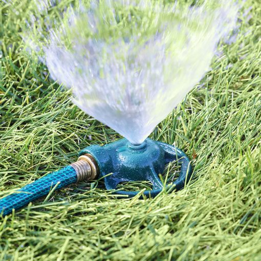 Melnor Circular Spot Sprinkler watering green lawn