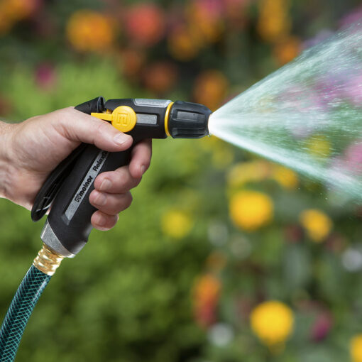 R200 Melnor RelaxGrip Adjustable Nozzle spraying water in front of colorful background