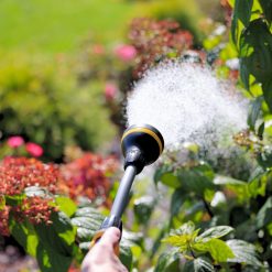 Melnor RelaxGrip® Shower Head Watering Wand watering a plant gently