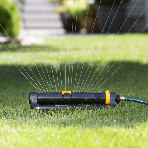 XT4100 Melnor 4,500 Sq. Ft. Turbo Oscillating Sprinkler gently watering