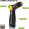 This image shows a Melnor RelaxGrip garden hose nozzle with features labeled: thumb control, adjustable tip, slip-resistant grip, and metal to the core.