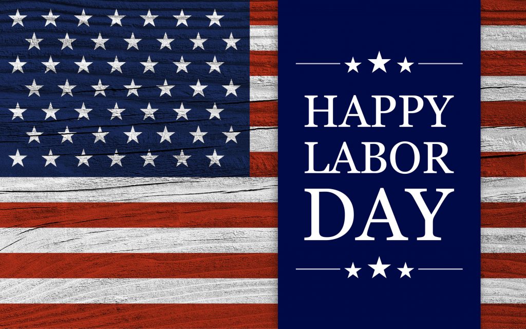 The image displays an artistic rendition of the American flag, with a blue panel on the right featuring the greeting "HAPPY LABOR DAY" in white text and stars.