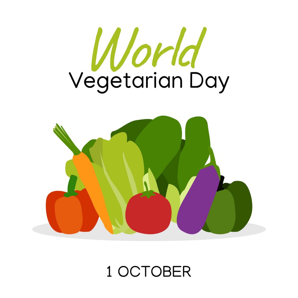 The image features a graphic celebrating World Vegetarian Day on October 1, with colorful illustrations of vegetables such as carrots, peppers, and eggplants.