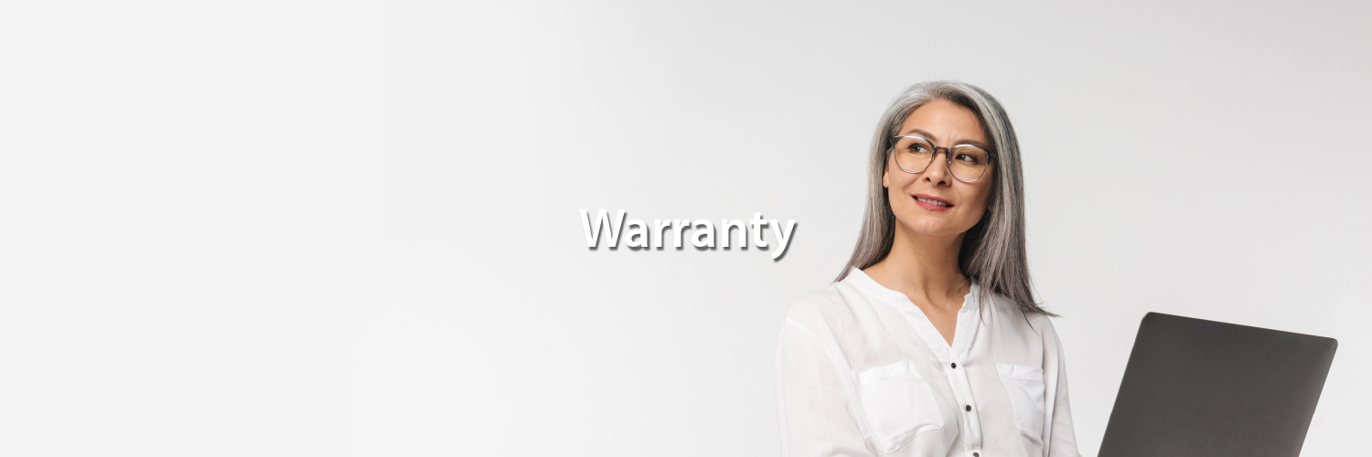 A person wearing glasses and a white shirt holds a closed laptop, standing confidently against a white background with the word "Warranty" above.